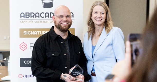 Mitchell Roush, newly named Nebraska School Communicator of the Year, poses with Dr. Jill Johnson, President of Class Intercom. The NebSPRA School Communicator of the Year Award is presented by Class Intercom.