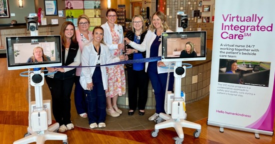 irtual Integrated Care was officially introduced at St. Francis during a staff ribbon-cutting ceremony this morning. Currently, the new technology is active in the Medical/Surgical and Progressive Care Units, with connectivity available in the Intensive Care Unit. Pictured (L to R) are nurses Cari Taylor, Kylie Grzywa, Kalee Gustafson, Brooke Schmitt, Ashley Hermesch, and Meghann Kowalski, alongside Claire Jackman and Emily Dempsey appearing on screen, all of whom played key roles in the launch.