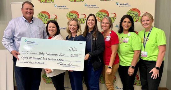 PHOTO 2: (L to R: Brad Bell, Tesia Gust, Emily Smith, Beth Deida, Jessica Keene, Melissa Griffith and Morgan Rader.) The hospital’s Maternity Center received an $81,311 check from the St. Francis Foundation to create a new Baby Bereavement Suite, a space dedicated to parents grieving the unimaginable loss of a newborn.