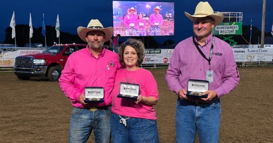 Jeff and Becky Crecelius (on the left), and Mark Hinrichs, were honored with Oregon Trail Rodeo Committee People of the Year (for the Crecelius’) and Volunteer of the Year (for Hinrichs) at the Hastings PRCA rodeo on August 15. Photo by R. Nicolaus